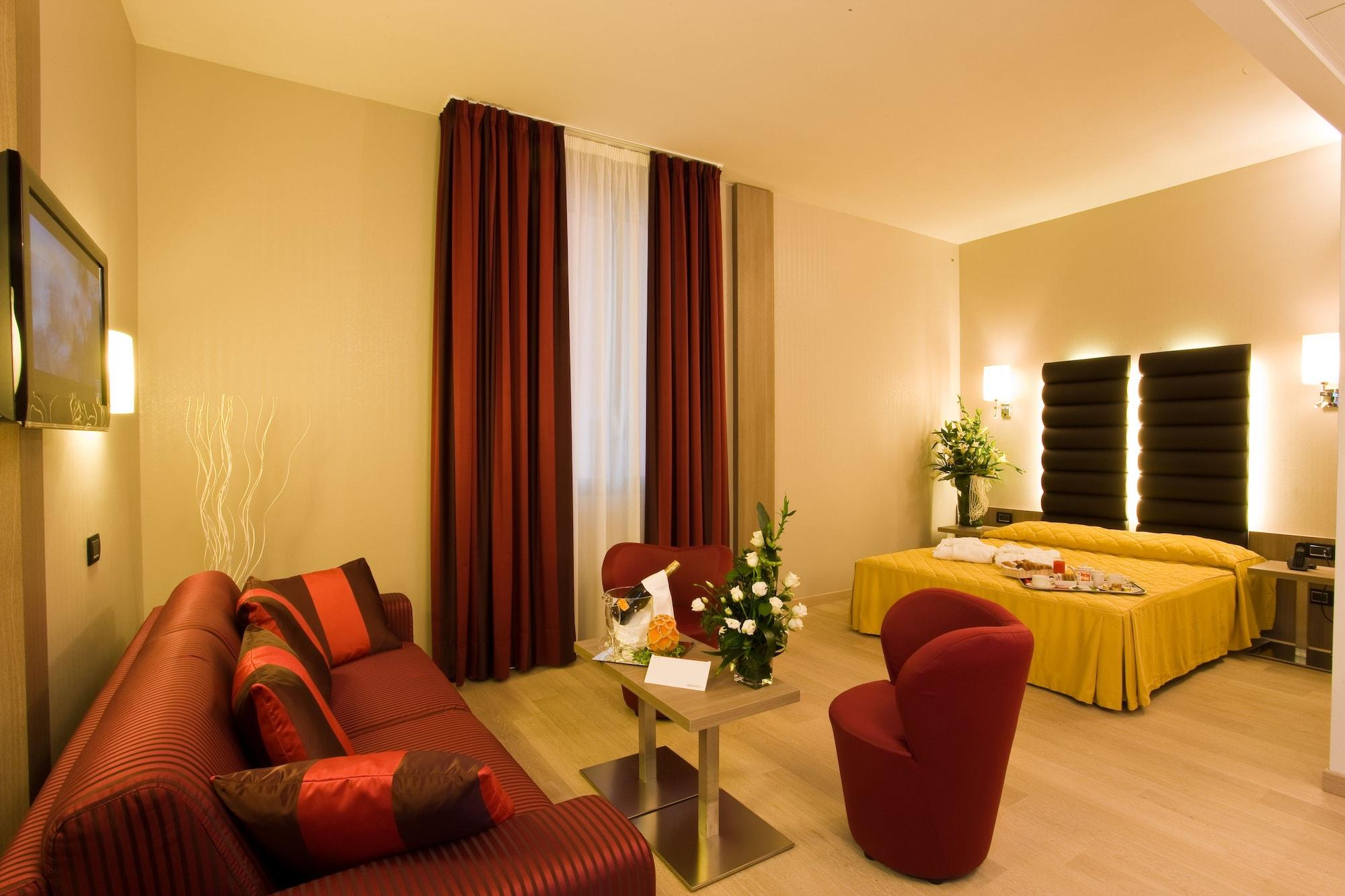Hotel Cosmopolitan Bolonia Habitación foto